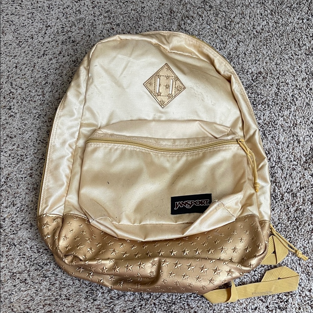 JanSport Metallic Gold Backpack with Star Design